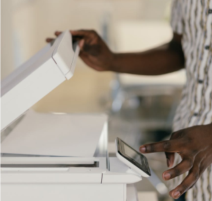 person using a copier